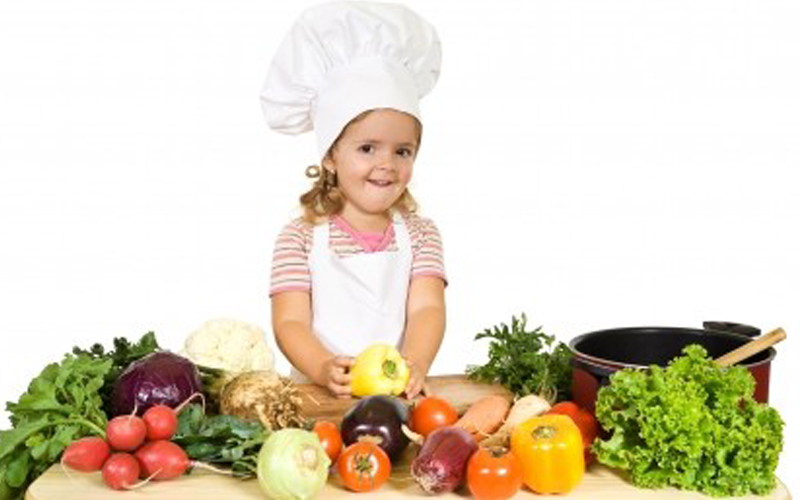 Young girl with vegetables